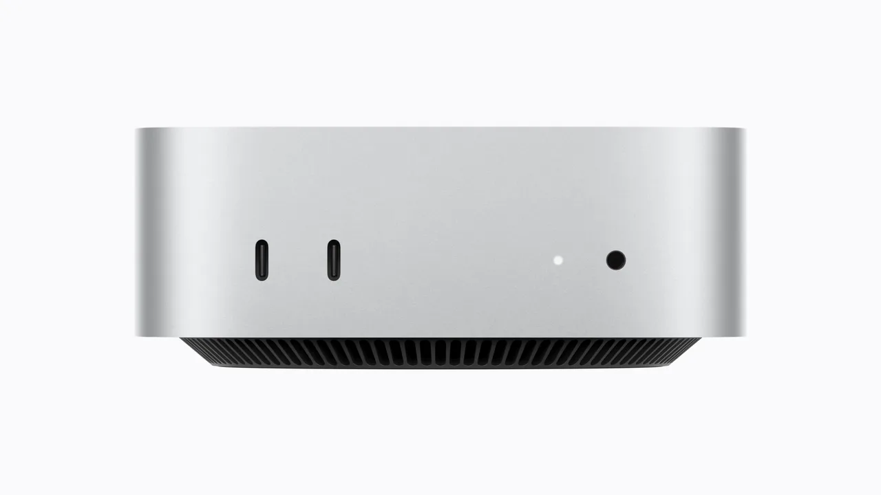 The front of the new Mac mini, with two USB-C ports, a status light and a headphone jack. There are no USB-A ports.