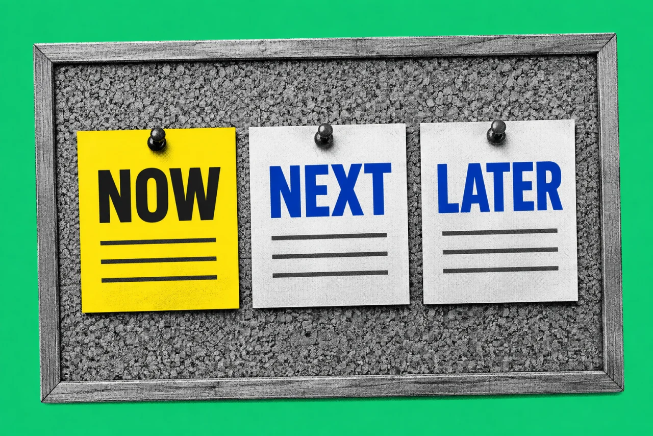 A cork board with three index cards pinned in a row, on an emerald background. The cards read "NOW", "NEXT" and "LATER" in bold, with the NOW card bright yellow.